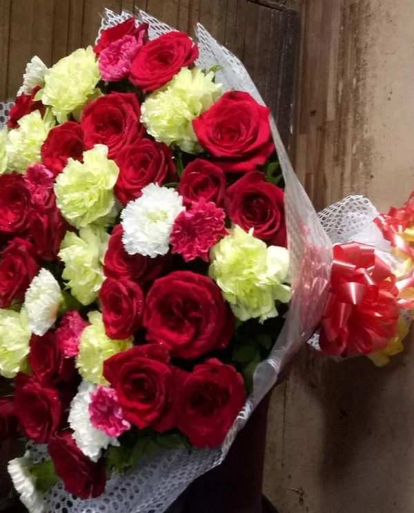 Carnation and Roses Hand Bouquet Rs 1550