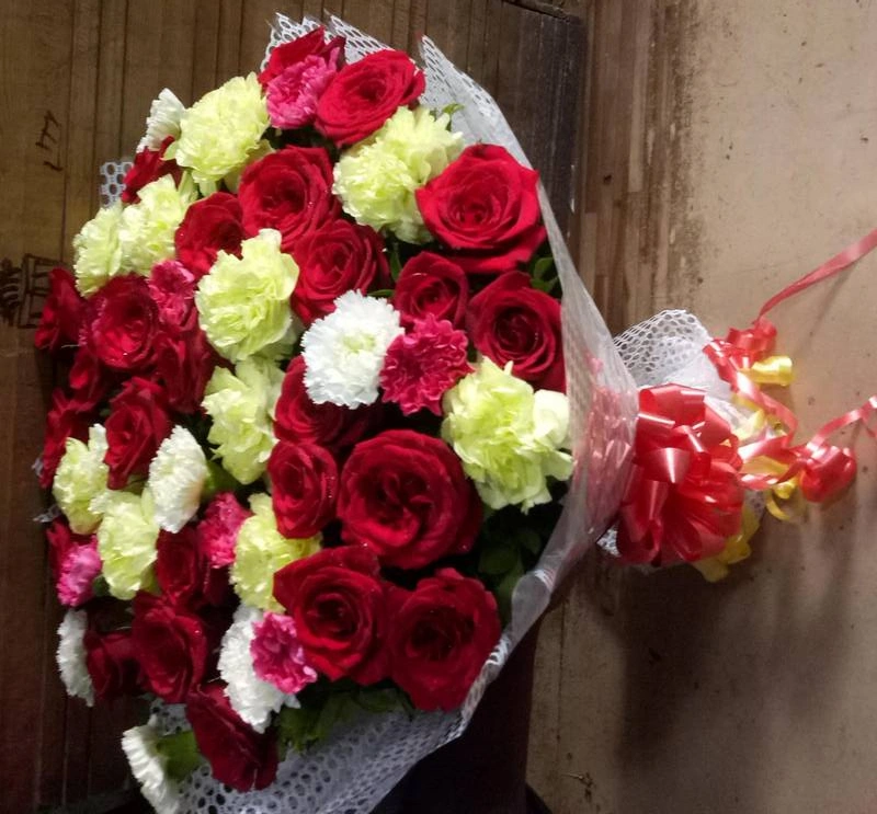 Carnation and Roses Hand Bouquet Rs 1550