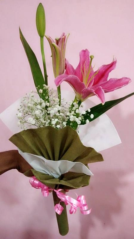 Elegant Lilies with Tissue Paper Packing Rs 549