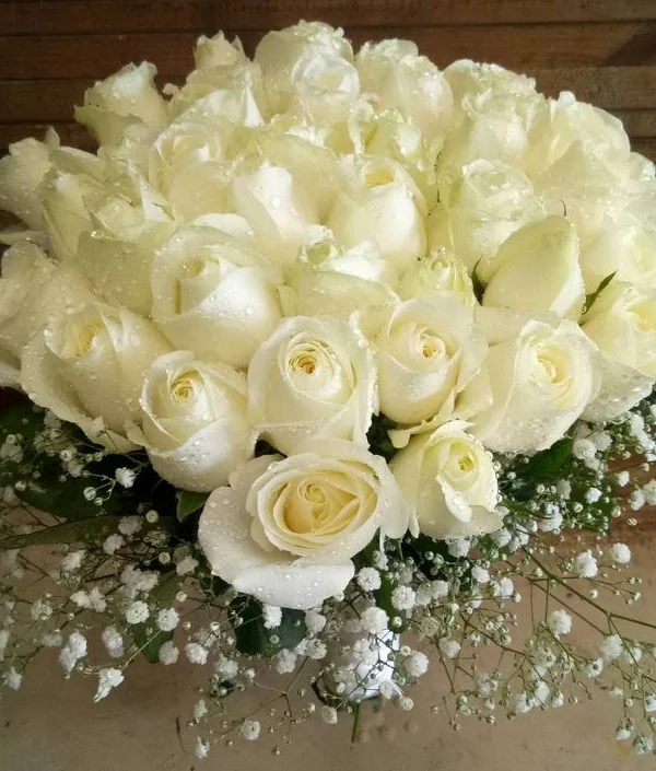 White Roses Hand Bouquet Rs 1129