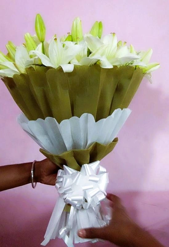 Handcrafted Lilies Hand Bouquet Rs 1999