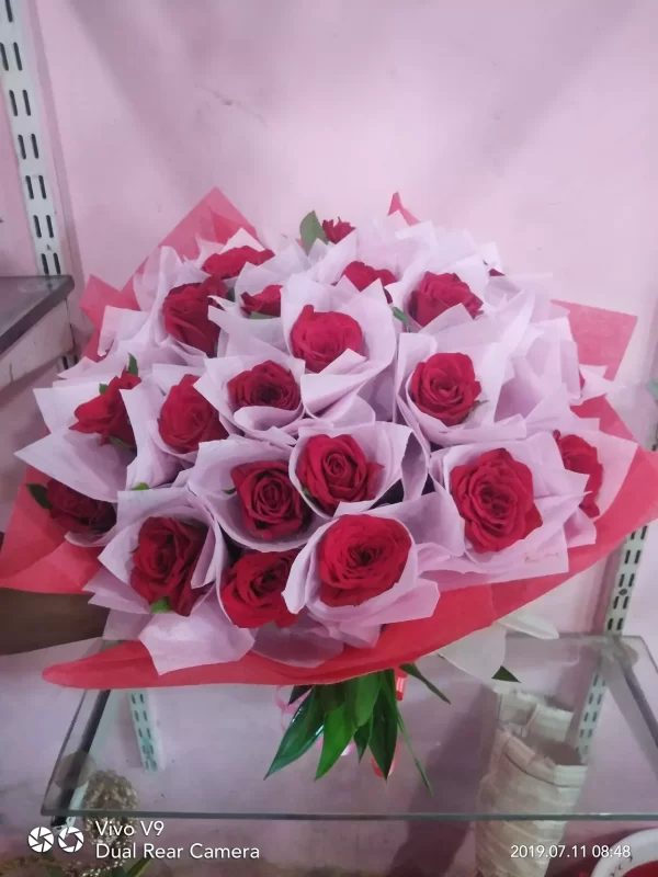 Elegant Red Rose Bouquet in Pink Wrap